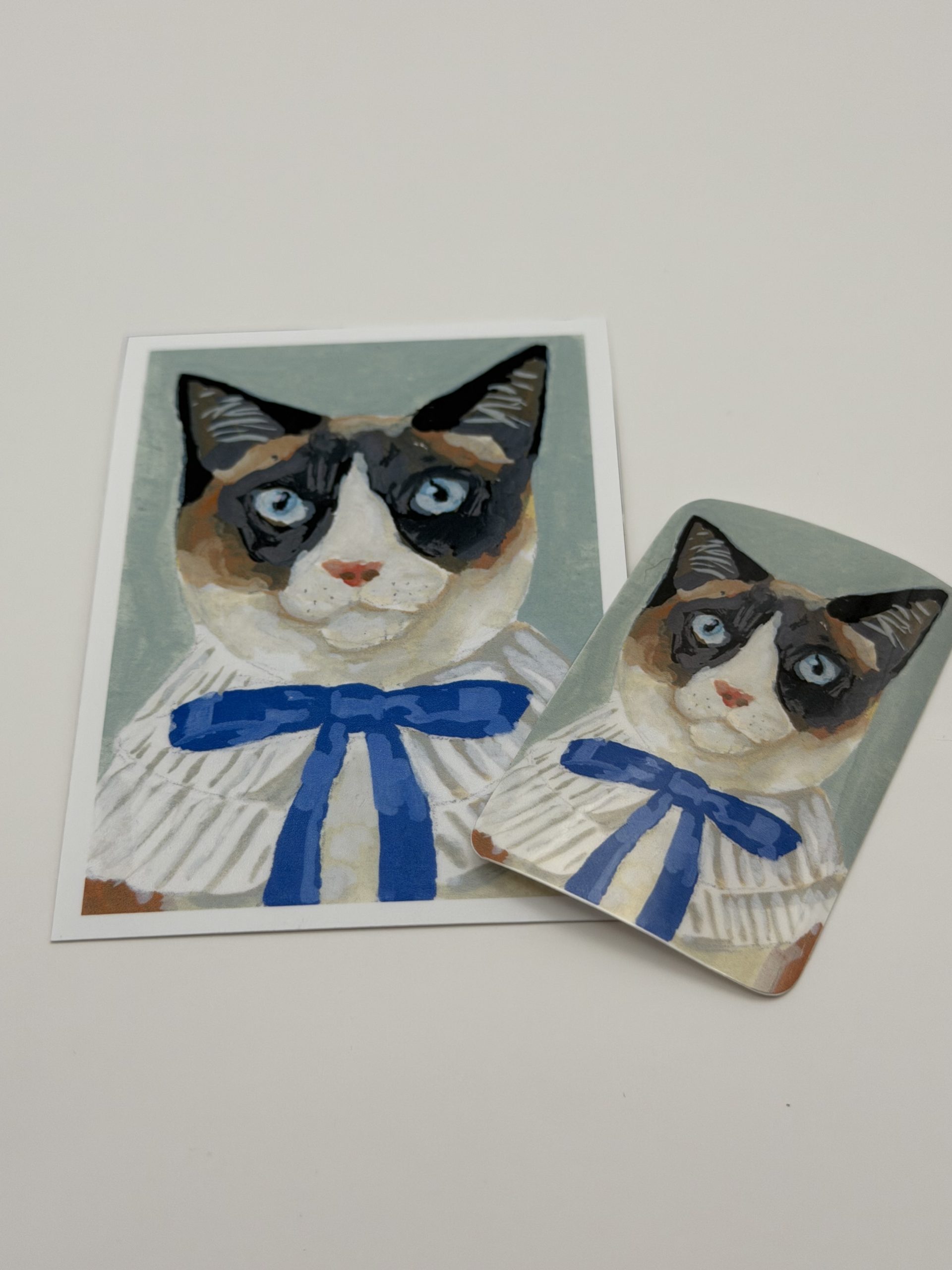 Illustration of car with blue bow print and matching sticker